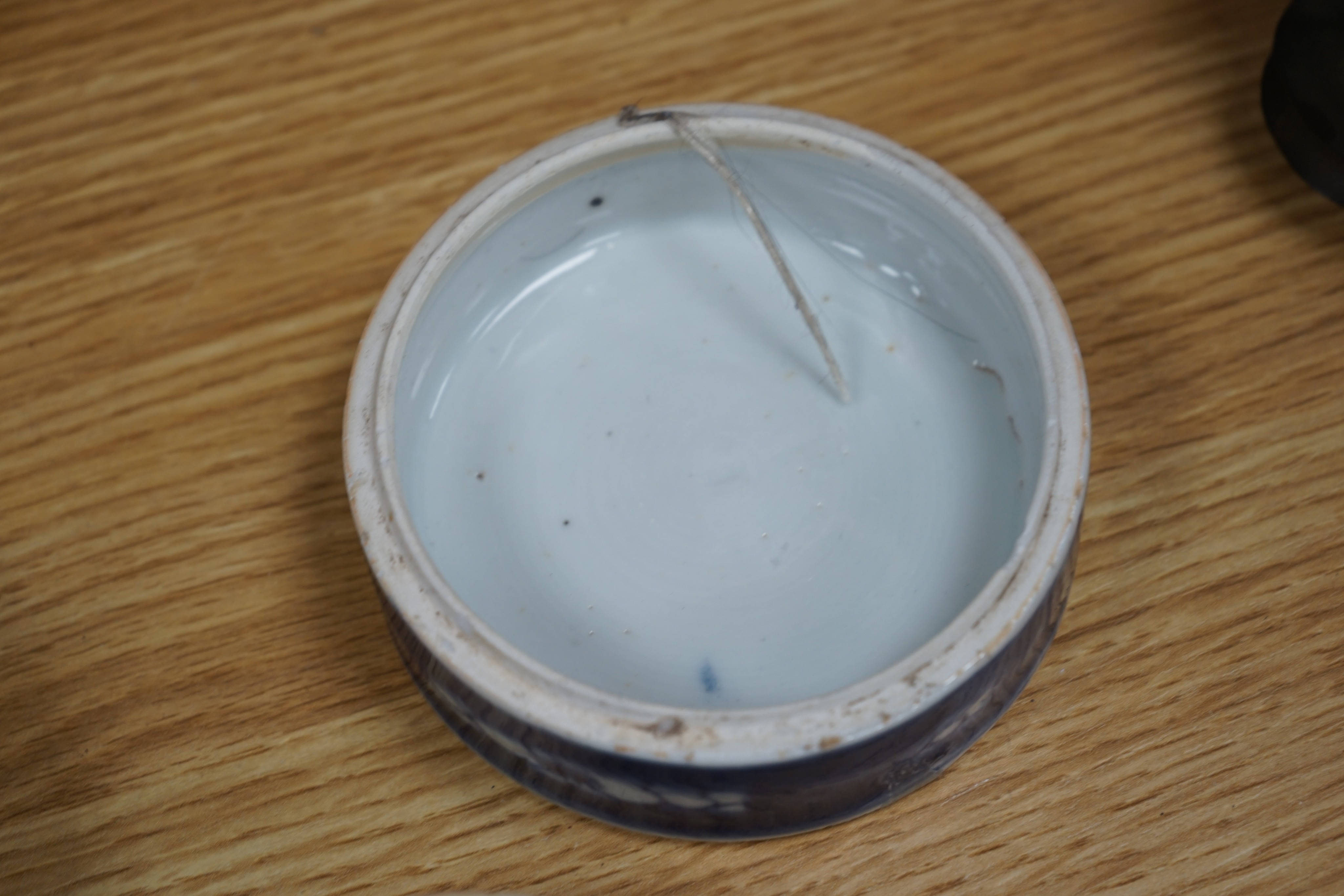 A Chinese blue and white ovoid jar and cover and similar stacking box, Kangxi and a Qing blue and white footed cup, tallest 15cm